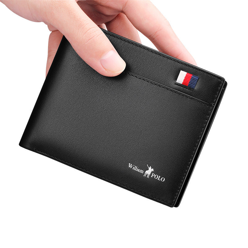 Black wallet with a brand logo held by a hand on a white background