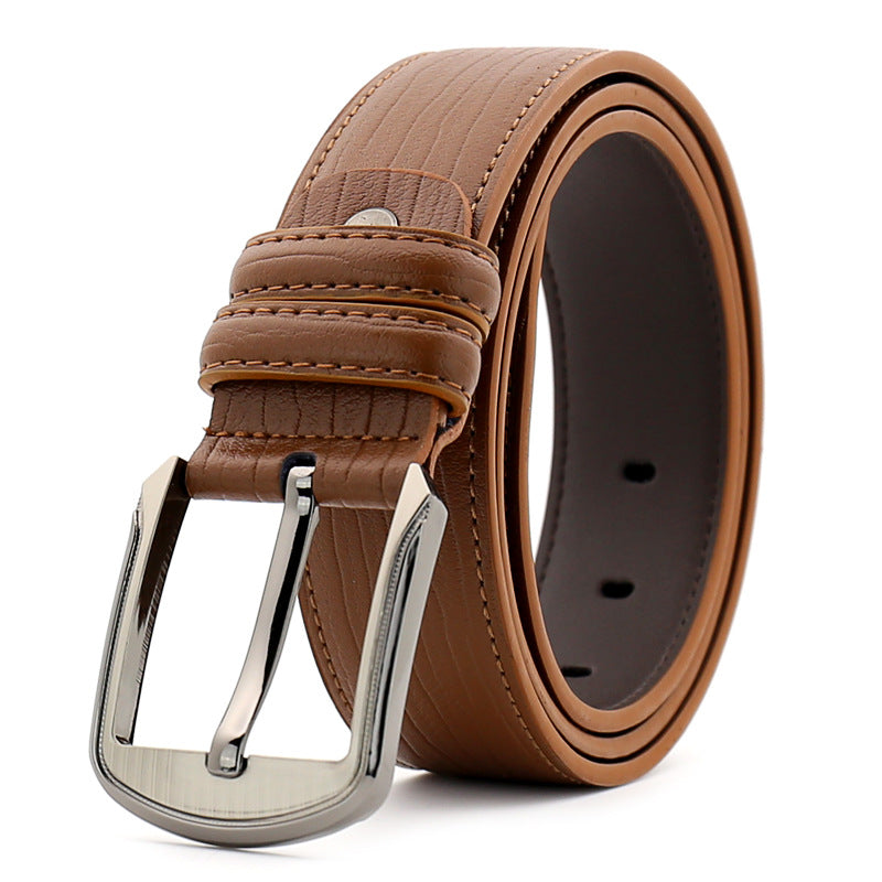Brown leather belt with silver buckle on a white background