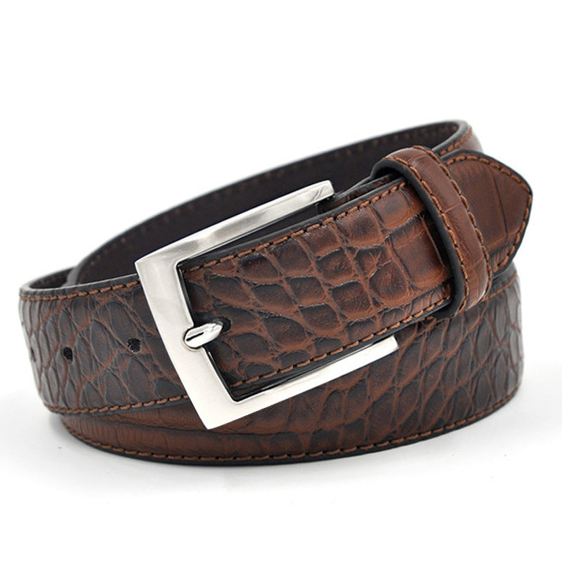 Brown leather belt with a silver buckle on a white background